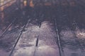 Wooden floor with rain drops, fall background