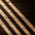 Wooden floorboards in a diagonal shadowed pattern illuminated by Royalty Free Stock Photo