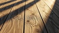 Floorboards with natural knots and grain patterns reflecting warm Royalty Free Stock Photo
