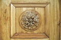 Wooden flower of decoration on the door Royalty Free Stock Photo