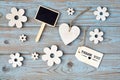 wooden flowers and heart with calk board on a old wooden background with empty space layout Royalty Free Stock Photo