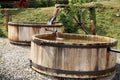 Wooden, flowing water tanks.