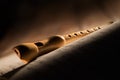 Wooden flute with musical score Royalty Free Stock Photo