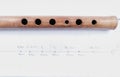 wooden flute quena holes on paper