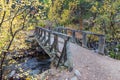 Wooden Foot Bridge Over the Stream
