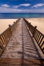 Wooden footbridge on the beach Royalty Free Stock Photo