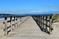 Wooden footbridge at beach with view to the Baltic Sea Royalty Free Stock Photo