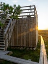 Wooden footbridge, evening sunlight,