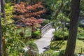 The wooden footbridge in the Japanese Gardens exhibit in Manito Park, Spokane, Washington, USA Royalty Free Stock Photo