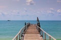 Wooden footbridge leading to the sea