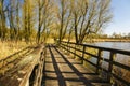 Wooden footbridge in a park.