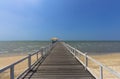 Wooden footbridge in sea view on the beach Royalty Free Stock Photo