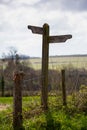 A Wooden footpath sign in the English countryside Royalty Free Stock Photo