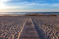 Wooden footpath to the sea Royalty Free Stock Photo