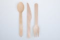 wooden fork spoon and knife made from recycled brown wood on white Background Royalty Free Stock Photo