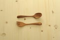 Wooden fork and spoon on table