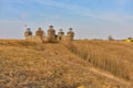 Wooden fortress in the field, old Russian wooden structure, village tower in the field Royalty Free Stock Photo