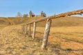 Wooden fortress in the field, old Russian wooden structure, village tower in the field Royalty Free Stock Photo