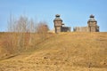 Wooden fortress in the field, old Russian wooden structure, village tower in the field Royalty Free Stock Photo