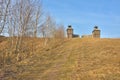 Wooden fortress in the field, old Russian wooden structure, village tower in the field Royalty Free Stock Photo