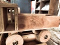Wooden four wheeler toy blur background