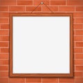 Wooden frame on brick wall Royalty Free Stock Photo