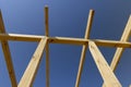 the wooden frame of the building against the blue sky Royalty Free Stock Photo