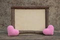 Wooden frame with heart on the wooden table