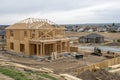 Wooden frame house structure under construction Royalty Free Stock Photo