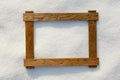 Wooden frame on natural snow
