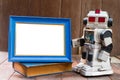 wooden frame and oldrobot Royalty Free Stock Photo