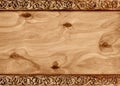 Wooden frame with pattern of flower carved on wood. Royalty Free Stock Photo