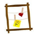 Wooden frame with the post it says i love you and heart hanging on clothes hooks Royalty Free Stock Photo