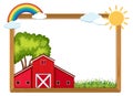 Wooden frame with red barn and rainbow