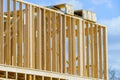 Wooden frame structure house building on a new development framing of under construction Royalty Free Stock Photo