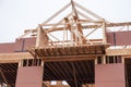 Wooden frame of the top of a house under construction