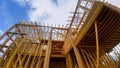 Wooden framing of a home, full frame new construction of a new house framing of a home, full frame Royalty Free Stock Photo