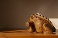 Wooden frog. Musical instrument made of wood. Stick and frog with teeth to extract sound Royalty Free Stock Photo
