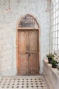 The wooden front door of a home with glass panels Royalty Free Stock Photo
