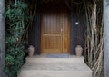 Wooden front door to the house Royalty Free Stock Photo