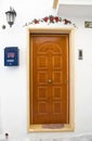 Wooden frontdoor. Royalty Free Stock Photo