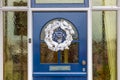 Wooden frontdoor of house with decoration Royalty Free Stock Photo