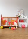 Wooden furniture in babygirl room Royalty Free Stock Photo