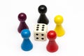 Wooden game pieces on white background