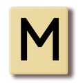 Wooden game tile with the letter M