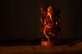 Wooden ganesha god figurine