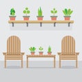 Wooden Garden Chairs And Pot Plants Royalty Free Stock Photo