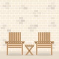 Wooden Garden Chairs With Table In Front Of Bricks Wall