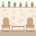 Wooden Garden Chairs With Table And Pot Plants Royalty Free Stock Photo