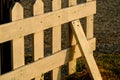 A wooden garden fence at backyard and bloom tree Royalty Free Stock Photo